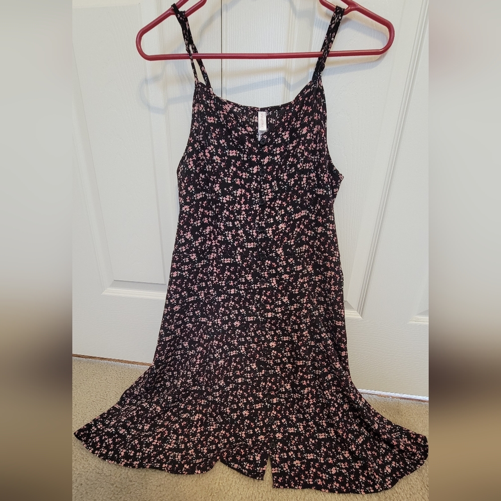 Black mini dress with pink floral pattern